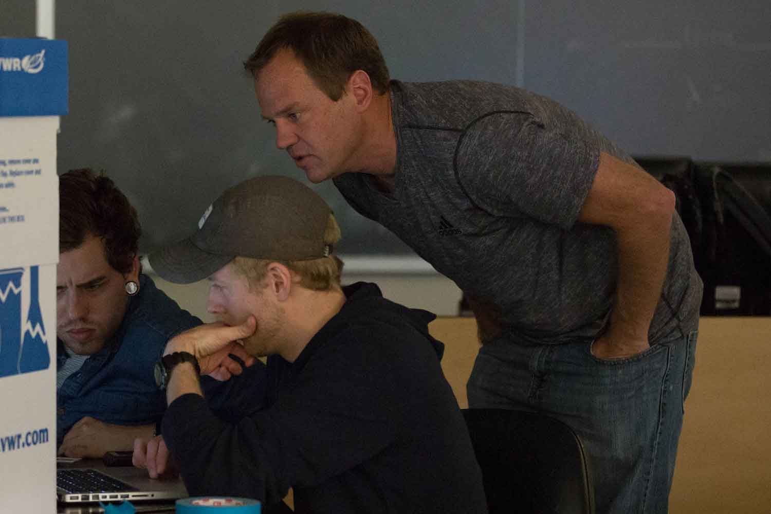 Instructor working with students in class