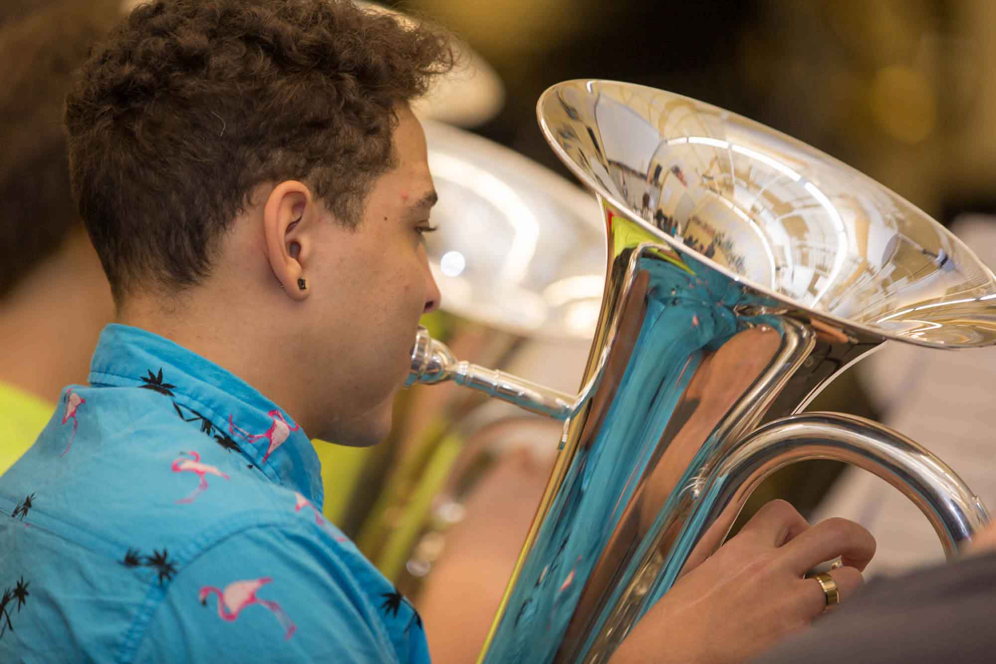 A student practicing a tuba