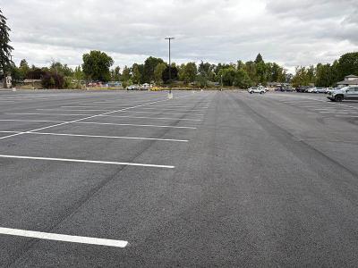 A newly repaved and repainted parking lot