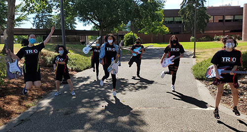 A group of Upward Bound students with guitars