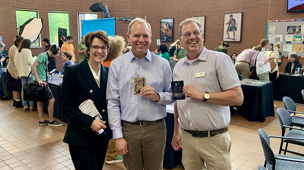 President Howard, Instructor Peter Hoelter, and Dean Don Brase in the Student Center