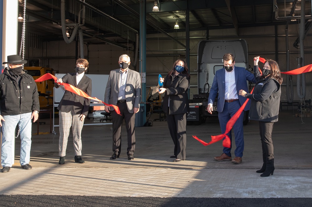 Marion County Commissioners and Chemeketa officials cut the ribbon at the new Diesel training center